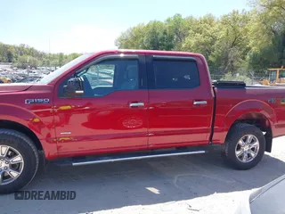 2015 Ford F-150 XLT with VIN 1FTEW1EG0FFC88740, listed as a IAAI auction lot 42247998 with 60,767 mi miles and . Bid and sale history available at DreamBid. Image 14.