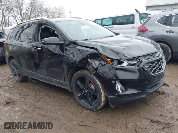 2021 Chevrolet Equinox Premier z VIN 2GNAXNEV4M6125086, wystawiony jako IAAI lot #41475387 z przebiegiem 53 387 mil mil oraz . Historia ofert i sprzedaży dostępna na DreamBid. Obrazek 1.