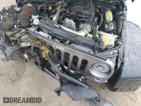 2015 Jeep Wrangler Unlimited Freedom with VIN 1C4BJWDG6FL568583, listed as a Copart auction lot 54266315 with Not provided miles and Salvage title. Bid and sale history available at DreamBid. Image 12.