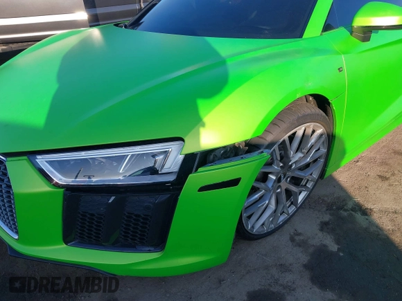 2017 Audi R8 z VIN WUAVACFX5H7903923, wystawiony jako IAAI lot #41348191 z przebiegiem 53 883 mil mil oraz . Historia ofert i sprzedaży dostępna na DreamBid. Obrazek 6.