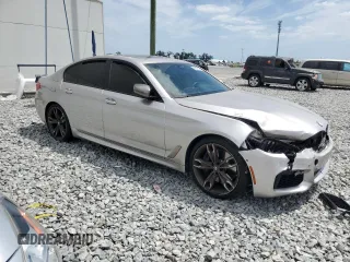 2019 BMW 5 Series M550i xDrive with VIN WBAJB9C53KB464902, listed as a Copart auction lot 54252875 with 45,157 mi miles and Salvage title. Bid and sale history available at DreamBid. Image 4.