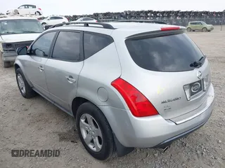 2003 Nissan Murano SE z VIN JN8AZ08TX3W103022, wystawiony jako IAAI lot #42216357 z przebiegiem 208 838 mil mil oraz . Historia ofert i sprzedaży dostępna na DreamBid. Obrazek 3.