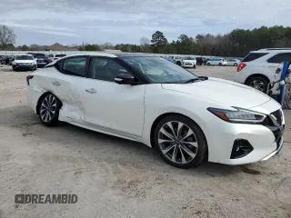 2023 Nissan Maxima Platinum with VIN 1N4AA6FV1PC507737, listed as a Copart auction lot 45712415 with 28,135 mi miles and Salvage title. Bid and sale history available at DreamBid. Image 4.