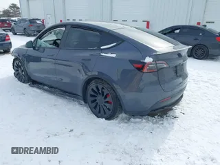 2023 Tesla Model Y Performance with VIN 7SAYGDEF0PF898181, listed as a IAAI auction lot 41577666 with 19,051 mi miles and . Bid and sale history available at DreamBid. Image 3.
