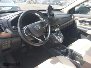 2018 Honda CR-V Touring with VIN 2HKRW2H96JH690197, listed as a IAAI auction lot 41902741 with 34,637 mi miles. Bid and sale history available at carsss.com. Image 5.