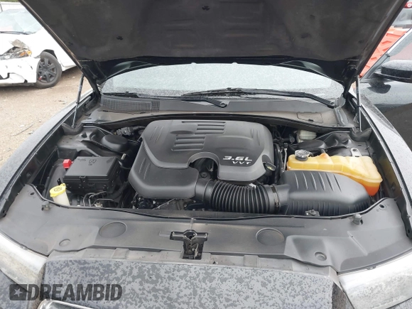 2013 Dodge Charger SE with VIN 2C3CDXBG6DH625531, listed as a IAAI auction lot 41631995 with 175,511 mi miles and . Bid and sale history available at DreamBid. Image 10.