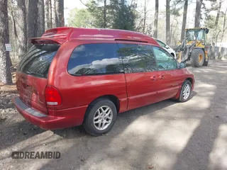 2000 Dodge Grand Caravan with VIN 1B4GT44L4YB570744, listed as a IAAI auction lot 41934100 with 174,579 mi miles and . Bid and sale history available at DreamBid. Image 4.