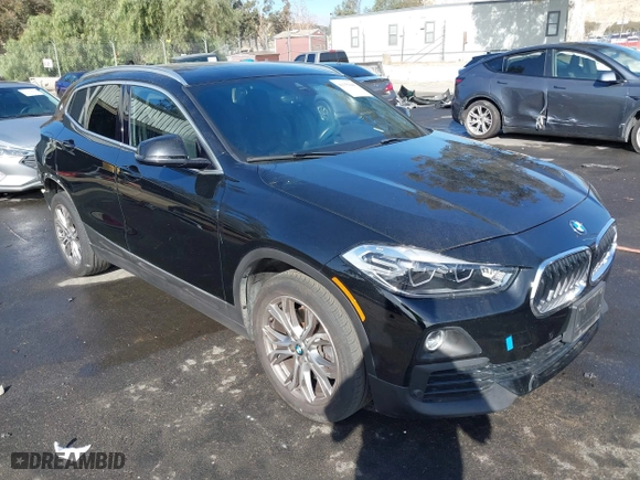 2019 BMW X2 xDrive28i with VIN WBXYJ5C52K5N24828, listed as a IAAI auction lot 41155049 with 59,597 mi miles. Bid and sale history available at carsss.com. Image 1.