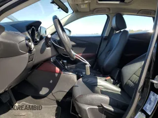 2016 Mazda CX-3 Grand Touring z VIN JM1DKBD79G0124504, wystawiony jako Copart lot #53663945 z przebiegiem 94 253 mil mil oraz Szkoda całkowita • Salvage title. Historia ofert i sprzedaży dostępna na DreamBid. Obrazek 7.