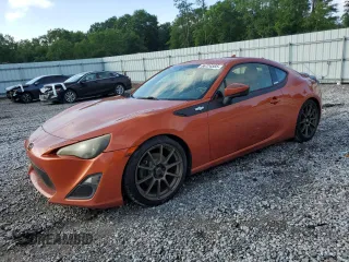2013 Scion FR-S z VIN JF1ZNAA12D1700999, wystawiony jako Copart lot #56724565 z przebiegiem 122 403 mil mil oraz Szkoda całkowita • Salvage title. Historia ofert i sprzedaży dostępna na DreamBid. Obrazek 1.