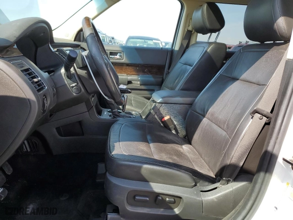 2016 Ford Flex Limited w/EcoBoost with VIN 2FMHK6DT1GBA08519, listed as a Copart auction lot 68823294 with 100,804 mi miles and Salvage Title. Bid and sale history available at carsss.com. Image 7.