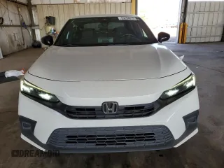 2022 Honda Civic Sport z VIN 2HGFE2F59NH595316, wystawiony jako Copart lot #55268015 z przebiegiem 85 021 mil mil oraz Szkoda całkowita • Salvage title. Historia ofert i sprzedaży dostępna na DreamBid. Obrazek 5.