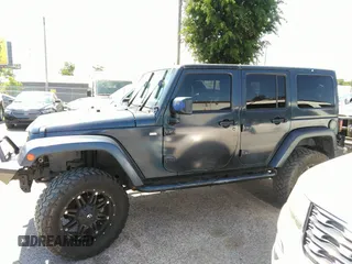 2013 Jeep Wrangler Unlimited Sport z VIN 1C4BJWDG1DL660844, wystawiony jako IAAI lot #42347284 z przebiegiem 168 709 mil mil oraz . Historia ofert i sprzedaży dostępna na DreamBid. Obrazek 14.