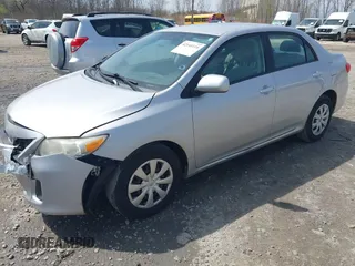 2011 Toyota Corolla L with VIN 2T1BU4EE0BC547772, listed as a IAAI auction lot 42140114 with 180,271 mi miles. Bid and sale history available at carsss.com. Image 2.