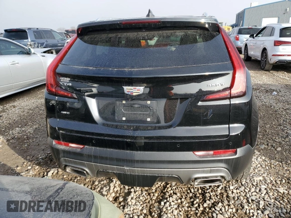 2021 Cadillac XT4 AWD Premium Luxury with VIN 1GYFZDR40MF080166, listed as a Copart auction lot 82883764 with 27,793 mi miles and Salvage Title. Bid and sale history available at carsss.com. Image 6.