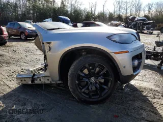 2011 BMW X6 50i with VIN 5UXFG8C58BLZ96045, listed as a Copart auction lot 50291795 with 0 mi miles and Salvage Title. Bid and sale history available at carsss.com. Image 4.