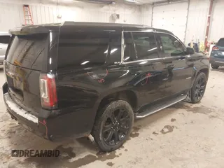 2016 GMC Yukon SLE with VIN 1GKS2AKC1GR276262, listed as a IAAI auction lot 41336378 with 213,182 mi miles. Bid and sale history available at carsss.com. Image 4.