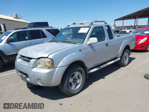 2001 Nissan Frontier SE Desert Runner z VIN 1N6ED26T51C362345, wystawiony jako IAAI lot #42324055 z przebiegiem 233 809 mil mil oraz . Historia ofert i sprzedaży dostępna na DreamBid. Obrazek 2.