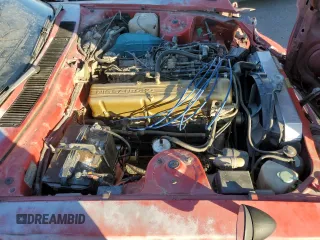 1983 Datsun 280ZX z VIN JN1HZ04S0DX569855, wystawiony jako Copart lot #74027594 z przebiegiem 12 300 mil mil oraz Szkody całkowita. Historia ofert i sprzedaży dostępna na DreamBid. Obrazek 11.