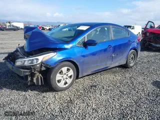 2017 Kia Forte LX with VIN 3KPFK4A75HE070555, listed as a IAAI auction lot 41652707 with 136,863 mi miles. Bid and sale history available at carsss.com. Image 2.