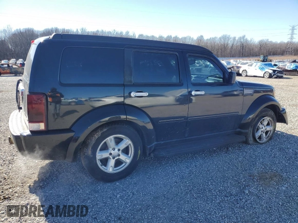 2007 Dodge Nitro SLT with VIN 1D8GU58K57W733434, listed as a Copart auction lot 41758595 with 211,545 mi miles and Clean Title. Bid and sale history available at DreamBid. Image 3.
