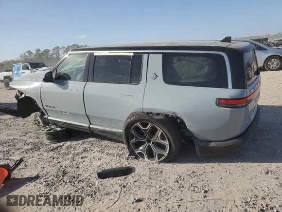 2025 Rivian R1S Adventure z VIN 7PDSGBBA5SN045424, wystawiony jako Copart lot #49675655 z przebiegiem Nie podano mil oraz Szkoda całkowita • Salvage title. Historia ofert i sprzedaży dostępna na DreamBid. Obrazek 2.