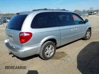 2005 Dodge Caravan SXT with VIN 2D8GP44L75R432427, listed as a IAAI auction lot 42049469 with 129,557 mi miles and . Bid and sale history available at DreamBid. Image 4.