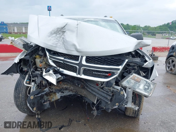2013 Dodge Journey Canada Value z VIN 3C4PDCABXDT563439, wystawiony jako IAAI lot #42227899 z przebiegiem 213 199 mil mil oraz . Historia ofert i sprzedaży dostępna na DreamBid. Obrazek 11.