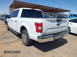 2019 Ford F-150 XL with VIN 1FTEW1C53KKC67450, listed as a IAAI auction lot 41846803 with 50,156 mi miles and . Bid and sale history available at DreamBid. Image 3.