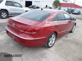 2014 Volkswagen CC Sport with VIN WVWBN7AN0EE527558, listed as a IAAI auction lot 41336204 with 130,005 mi miles and . Bid and sale history available at DreamBid. Image 4.