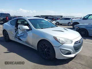 2014 Hyundai Genesis Coupe R-Spec z VIN KMHHT6KD6EU120667, wystawiony jako IAAI lot #41956038 z przebiegiem 163 464 mil mil oraz . Historia ofert i sprzedaży dostępna na DreamBid. Obrazek 1.