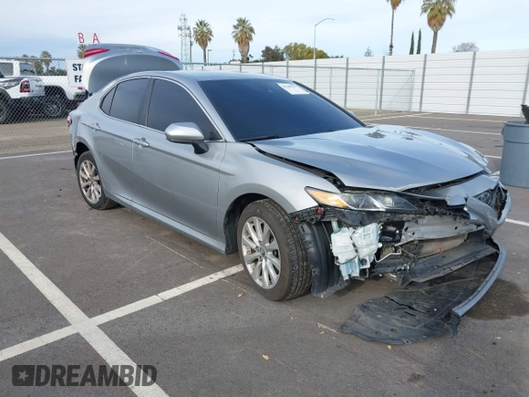 2019 Toyota Camry LE with VIN 4T1B11HK7KU803624, listed as a IAAI auction lot 41589107 with 169,863 mi miles and . Bid and sale history available at DreamBid. Image 1.