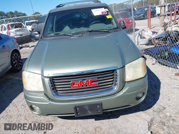 2003 GMC Envoy SLT with VIN 1GKDS13S432373988, listed as a IAAI auction lot 41840744 with 221,306 mi miles. Bid and sale history available at carsss.com. Image 12.