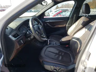 2017 BMW X1 xDrive28i with VIN WBXHT3C33H5F77000, listed as a Copart auction lot 41860993 with 113,553 mi miles. Bid and sale history available at carsss.com. Image 7.