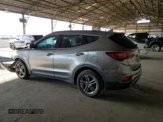 2018 Hyundai Santa Fe 2.4L с VIN 5NMZU3LB0JH055625, выставлен на аукционе Copart как лот 63696515 с пробегом 92 326 миль миль и Списание • Salvage title. История ставок и продаж доступна на DreamBid. Изображение 2.