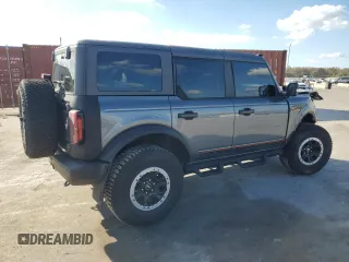 2022 Ford Bronco with VIN 1FMEE5DH1NLB82717, listed as a Copart auction lot 83230614 with 21,593 mi miles and Salvage Title. Bid and sale history available at DreamBid. Image 3.
