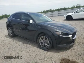 2022 Mazda CX-30 S Premium with VIN 3MVDMBDL2NM428998, listed as a Copart auction lot 57803465 with 49,090 mi miles and Salvage title. Bid and sale history available at DreamBid. Image 4.