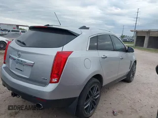 2015 Cadillac SRX Luxury Collection with VIN 3GYFNBE39FS535642, listed as a IAAI auction lot 41939207 with 109,842 mi miles. Bid and sale history available at carsss.com. Image 4.