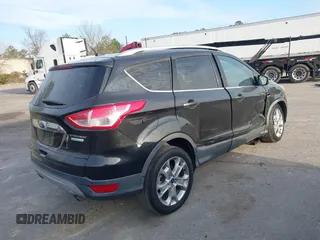 2015 Ford Escape Titanium with VIN 1FMCU0J98FUA19911, listed as a IAAI auction lot 41750596 with 106,706 mi miles. Bid and sale history available at carsss.com. Image 4.