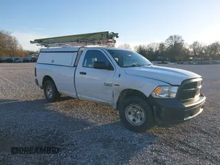 2015 Ram 1500 Tradesman with VIN 3C6JR7DTXFG660646, listed as a IAAI auction lot 41110327 with 136,581 mi miles and . Bid and sale history available at DreamBid. Image 1.