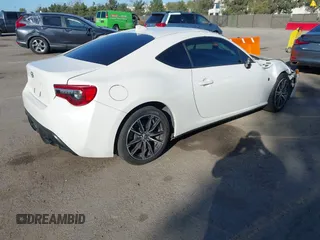 2017 Toyota 86 with VIN JF1ZNAA13H9703109, listed as a IAAI auction lot 41615885 with 134,757 mi miles. Bid and sale history available at carsss.com. Image 4.