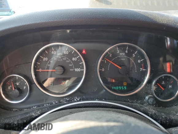 2013 Jeep Wrangler Unlimited Sport z VIN 1C4HJWDG9DL581643, wystawiony jako Copart lot #60775805 z przebiegiem 148 959 mil mil oraz Czysty tytuł • Clean title. Historia ofert i sprzedaży dostępna na DreamBid. Obrazek 9.
