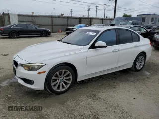 2013 BMW 3 Series 328i with VIN WBA3A5G57DNP23598, listed as a Copart auction lot 55677165 with 217,977 mi miles and Clean Title. Bid and sale history available at carsss.com. Image 1.