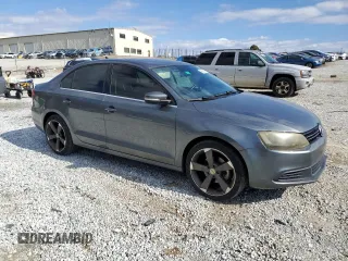 2014 Volkswagen Jetta TDI w/Premium/Nav с VIN 3VWLL7AJ7EM437287, выставлен на аукционе Copart как лот 42388315 с пробегом 169 380 миль миль и Списание • Salvage title. История ставок и продаж доступна на DreamBid. Изображение 4.