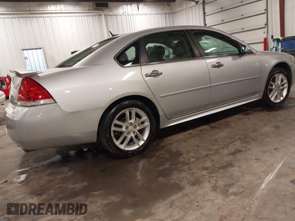 2014 Chevrolet Impala LTZ with VIN 2G1WC5E3XE1157931, listed as a IAAI auction lot 42688907 with 119,985 mi miles and . Bid and sale history available at DreamBid. Image 4.