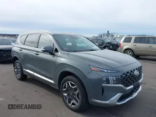 2021 Hyundai Santa Fe Calligraphy z VIN 5NMS5DAL1MH317365, wystawiony jako IAAI lot #41631459 z przebiegiem 69 977 mil mil oraz . Historia ofert i sprzedaży dostępna na DreamBid. Obrazek 1.