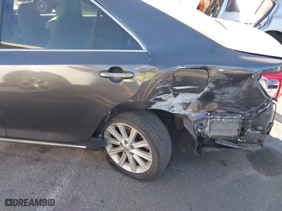 2014 Toyota Camry Hybrid LE with VIN 4T1BD1FK5EU106743, listed as a IAAI auction lot 41323019 with 84,511 mi miles. Bid and sale history available at carsss.com. Image 18.