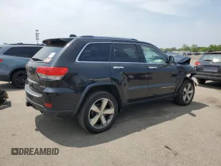 2014 Jeep Grand Cherokee Limited с VIN 1C4RJFBT0EC410818, выставлен на аукционе Copart как лот 59967155 с пробегом 129 880 миль миль и Списание • Salvage title. История ставок и продаж доступна на DreamBid. Изображение 3.