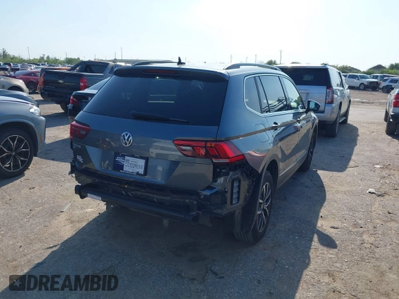 2020 Volkswagen Tiguan SE with VIN 3VV3B7AXXLM137641, listed as a IAAI auction lot 41830400 with 68,067 mi miles and . Bid and sale history available at DreamBid. Image 4.