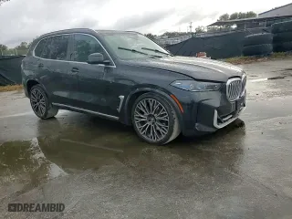 2024 BMW X5 xDrive40i with VIN 5UX23EU00R9U62752, listed as a Copart auction lot 85104184 with 23,547 mi miles and Salvage Title. Bid and sale history available at carsss.com. Image 11.